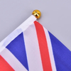 Hand waving UK flag